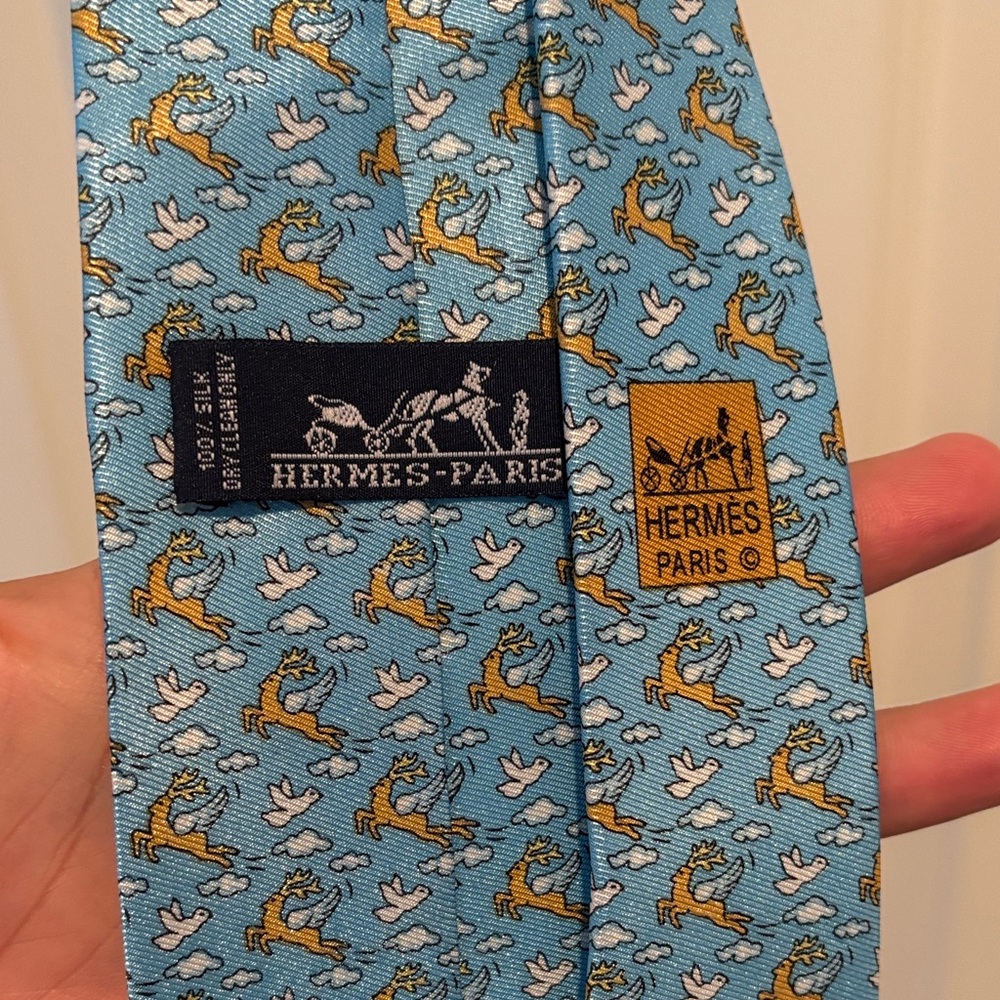 Hermes Light Blue Tie with Orange and White Animal Pattern